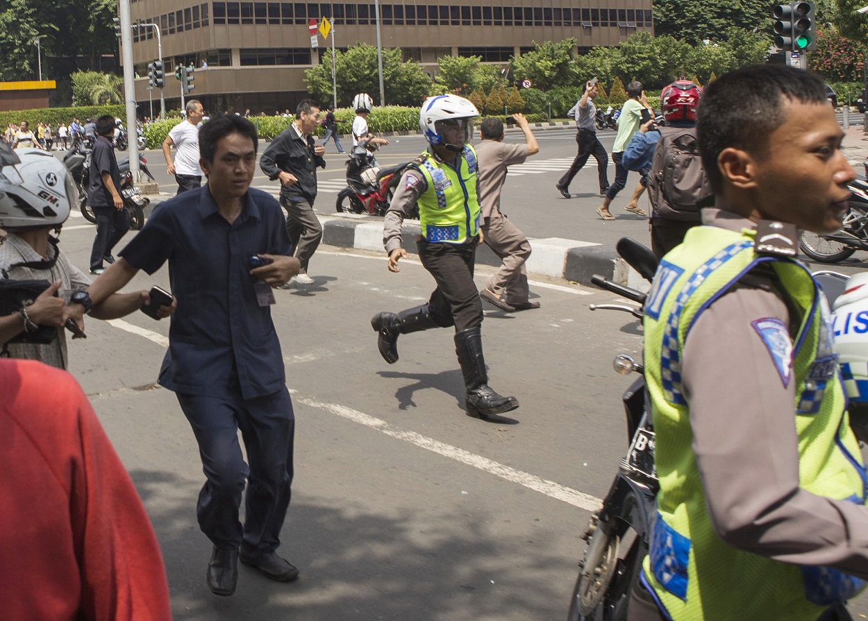 People flee attackers in Jakarta. AP/Press Association.
