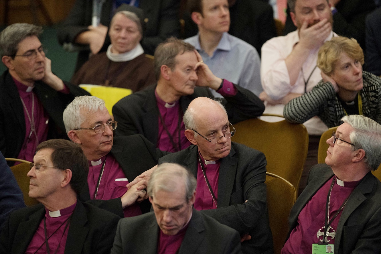 Members of the House of Clergy, meeting earlier this week. See Photo Credits.