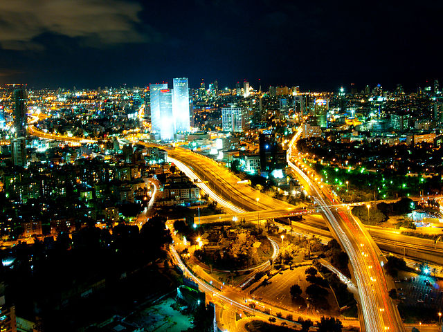 The bright lights of Tel Aviv. See Photo Credits.